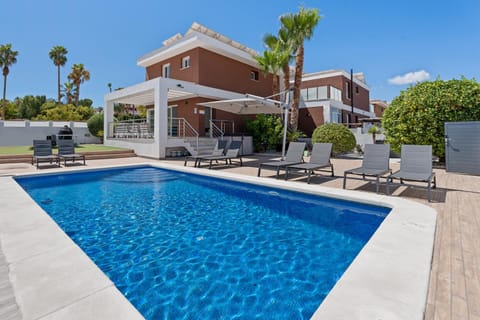 Property building, Living room, Swimming pool