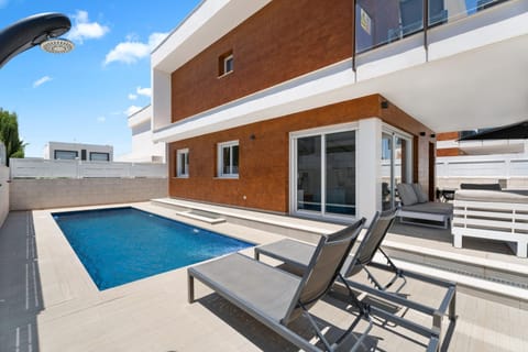 Property building, Living room, Swimming pool