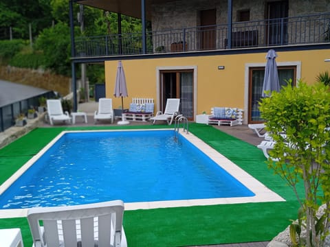 Property building, Pool view, Swimming pool, sunbed