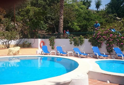 Property building, Living room, Swimming pool