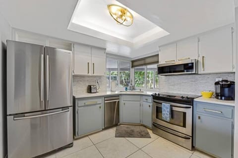 Home wpool by PMI OP Canal House in Oakland Park