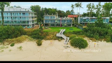 Property building, BBQ facilities, Beach, Beach, Windsurfing, Garden view, Parking