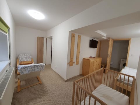 Photo of the whole room, Seating area, Bedroom, cot