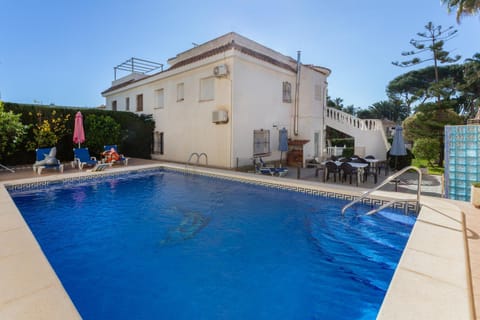 Property building, Living room, Swimming pool