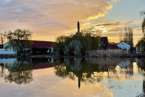 Property building, Restaurant/places to eat, Natural landscape, Lake view, Sunset