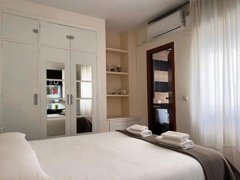 Bed, Bathroom, Bedroom, towels, wardrobe, air conditioner