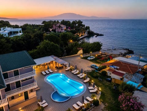 Property building, Natural landscape, Pool view, Sea view, Swimming pool, sunbed