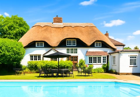 Property building, BBQ facilities, Seating area, Pool view