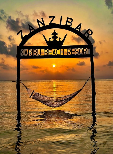 Nearby landmark, Day, Property logo or sign, Natural landscape, Logo/Certificate/Sign, Text overlay, Sea view, Sunrise, Sunset, Certificate/Award