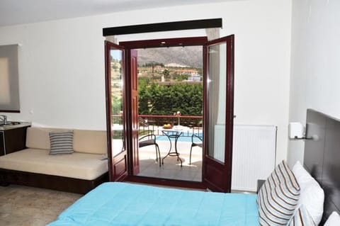 Toilet, Bed, Balcony/Terrace, Kitchen or kitchenette, Photo of the whole room, Bedroom