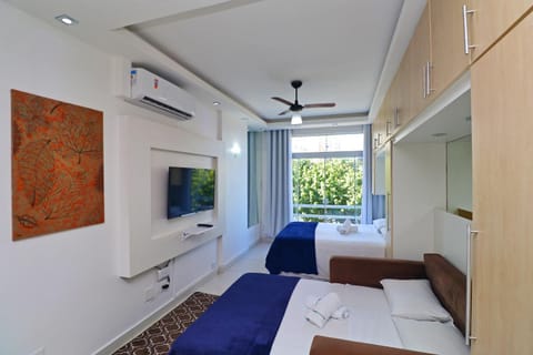 Bed, TV and multimedia, Bedroom, fireplace, wardrobe, air conditioner