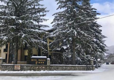 Property building, Facade/entrance, Property logo or sign, Property logo or sign, Winter, Seasons