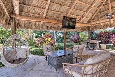 Poolside Paradise with Tropical Hut in Palm Beach House in Palm Beach Gardens