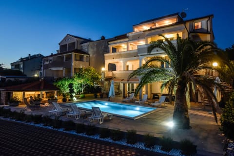 Property building, Swimming pool, Sunset