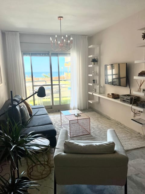 Living room, Seating area, Pool view, Sea view