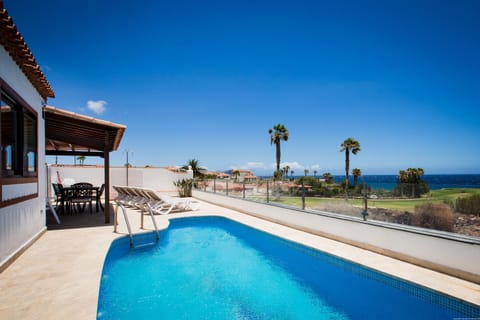 Property building, Living room, Swimming pool