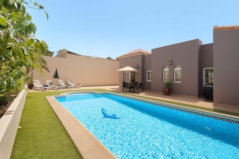 Property building, Living room, Swimming pool