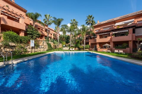 Property building, Living room, Swimming pool