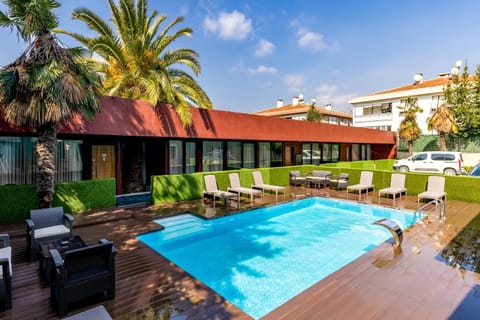 Property building, Garden, Decorative detail, Swimming pool, Parking