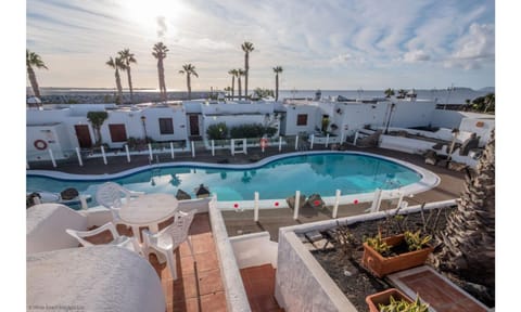 Property building, Living room, Swimming pool