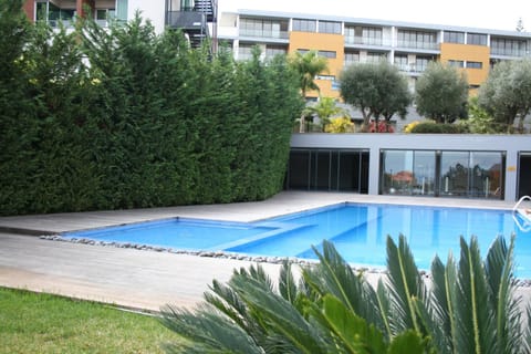 Property building, Facade/entrance, Day, Garden, Decorative detail, Swimming pool