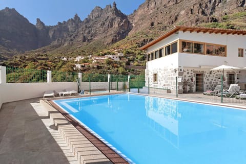 Property building, Living room, Swimming pool