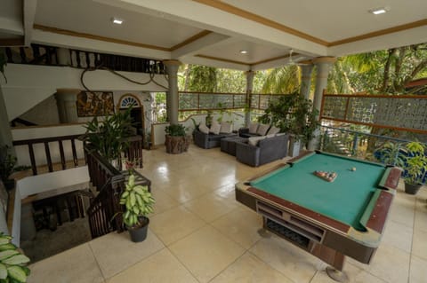 Property building, Billiard, Game Room, Living room, Seating area