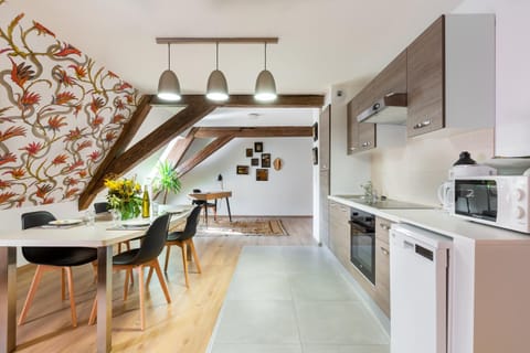 Dining area, dishwasher, oven, stove