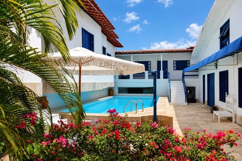 Property building, Patio, Day, Pool view, Swimming pool, sunbed