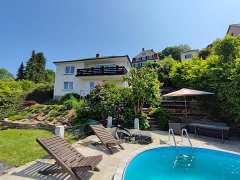 Property building, Garden, Pool view, Swimming pool, sunbed
