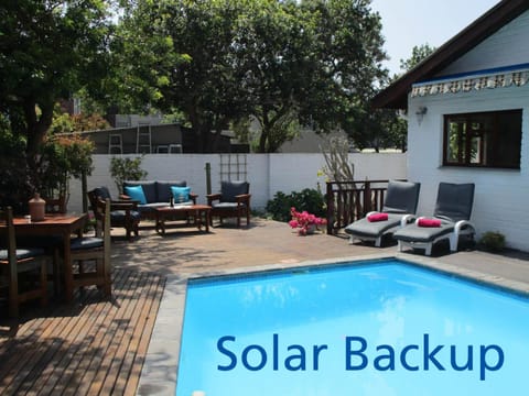 Property building, Patio, Swimming pool, sunbed