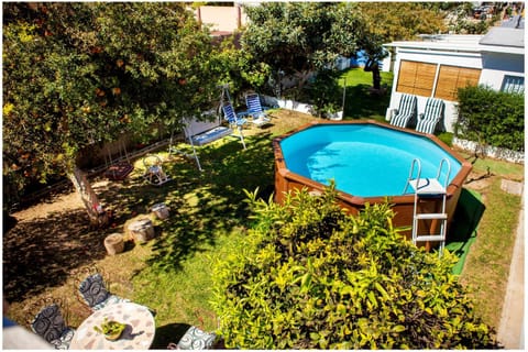 Property building, Living room, Swimming pool
