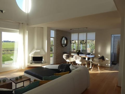 View (from property/room), Living room, Seating area, Dining area, Garden view