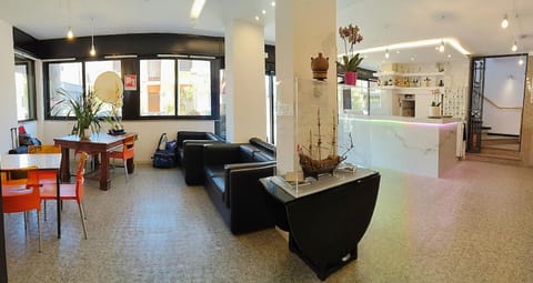 Property building, Facade/entrance, Living room, Seating area