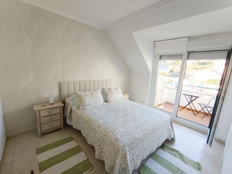 Precioso ático con vistas a pie de playa Apartment in Sanxenxo