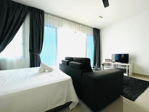 Bed, TV and multimedia, Living room, Seating area, Bedroom