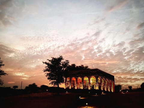 Property building, Restaurant/places to eat, Landmark view, Sunset