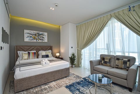 Bed, Living room, Seating area, Bedroom