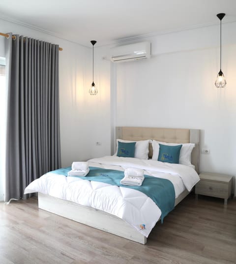 Bed, Photo of the whole room, Bedroom, towels, air conditioner