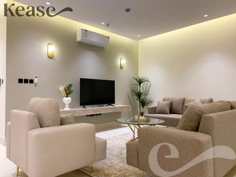 Communal lounge/ TV room, TV and multimedia, Living room, Seating area, Evening entertainment, Text overlay, air conditioner