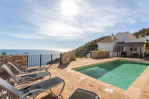 Property building, Living room, Swimming pool