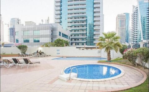Property building, Day, City view, Pool view, Swimming pool, Swimming pool, sunbed