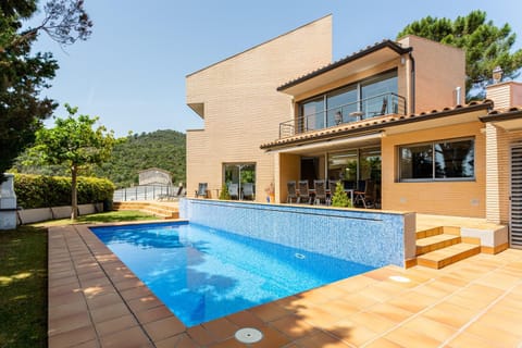 Property building, Living room, Swimming pool