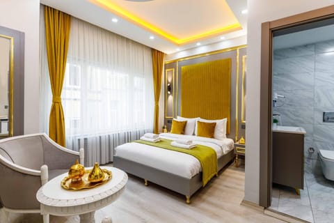 Toilet, Bed, Bathroom, Living room, Photo of the whole room, Seating area, Bedroom, towels