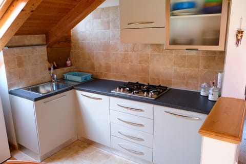 Kitchen or kitchenette, stove