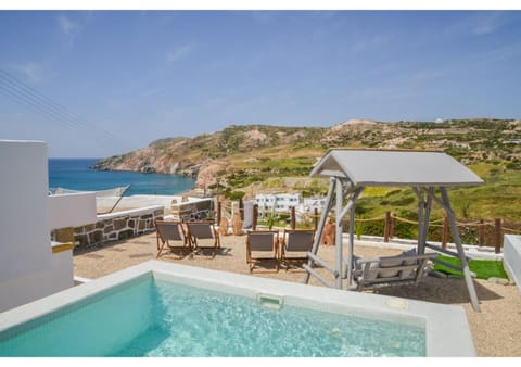 Property building, Facade/entrance, Seating area, Sea view, Sea view, Swimming pool