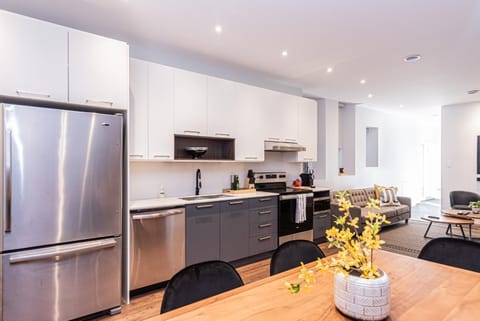 Kitchen or kitchenette, dishwasher, oven, stove