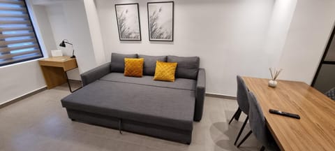 Bed, Living room, Seating area