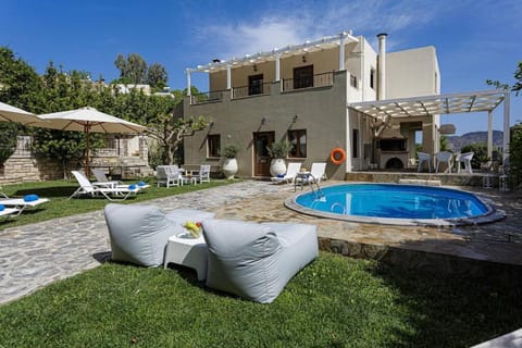 Property building, Patio, Garden, Pool view, sunbed