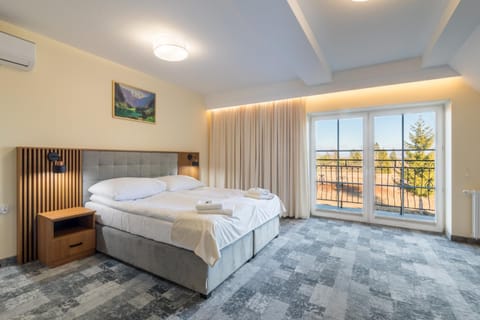 Bed, Photo of the whole room, Bedroom, towels, air conditioner